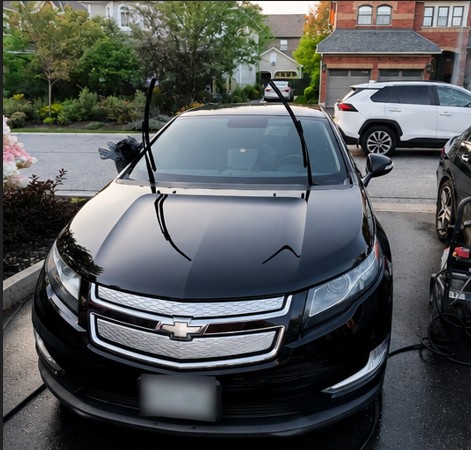 Clean black Chevrolet detailed by Wash Bros